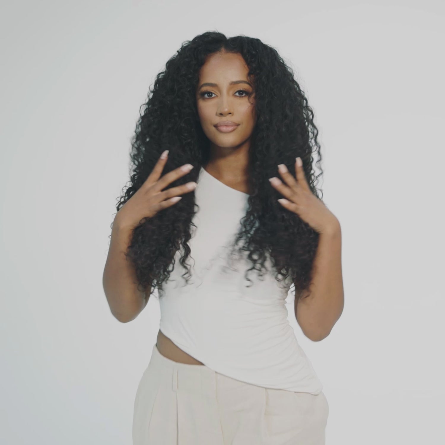 &quot;Model wearing a full big curly wig that look extremely natural. This wig is designed for alopecia, hair loss, fashion, or religious reasons. The wig features voluminous, bouncy curls and is showcased against a white studio background. The model has a natural, soft glam makeup look.